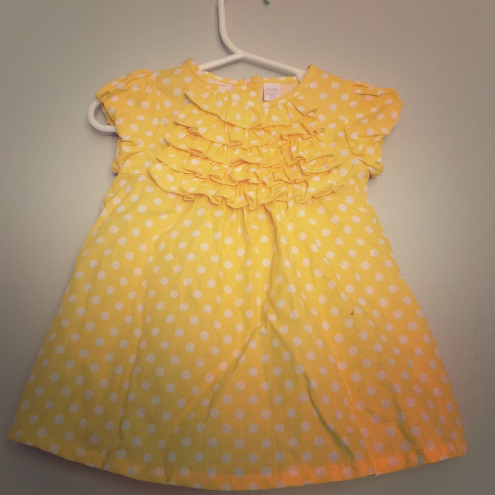 Child’s canary yellow dress - size 6-9 months.